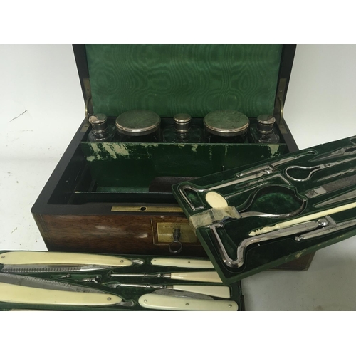 895 - A Quality late Victorian rosewood traveling case with a well fitted interior with numerous accoutrem... 