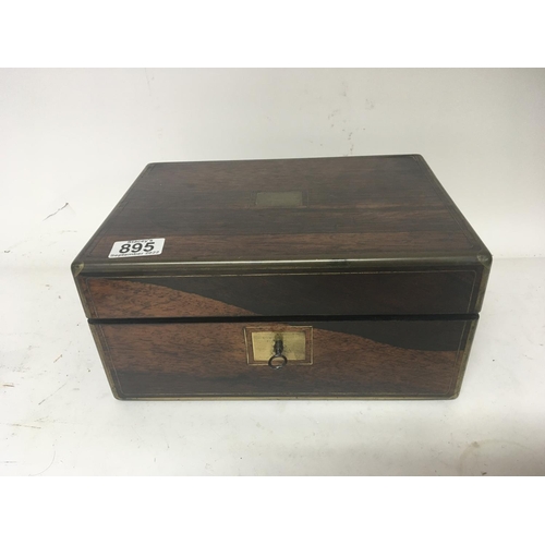 895 - A Quality late Victorian rosewood traveling case with a well fitted interior with numerous accoutrem... 