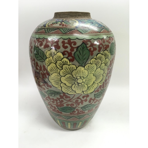 918 - An Oriental vase of baluster form with painted floral decoration, approx 29.5cm. NO RESERVE