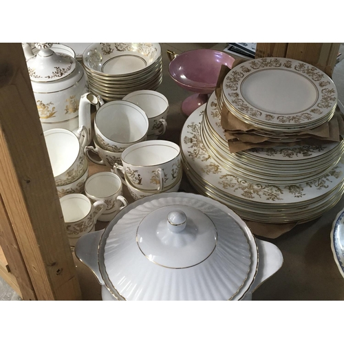 975 - A Coalport porcelain English bone China dinner and coffee service decorated with gilt floral pattern... 