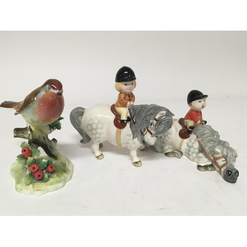 981 - Two Beswick comical equestrian figures designed by Norman Thelwell 1982 and a small porcelain bird o... 