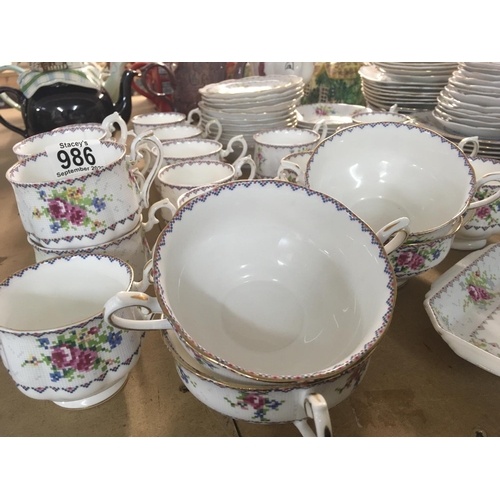 986 - A large Royal Albert tea set of geometric pattern including meat plates, saucers, soup bowls, cups a... 