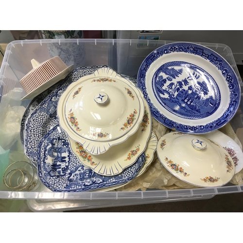 988 - A box of decorative ceramics and glassware.