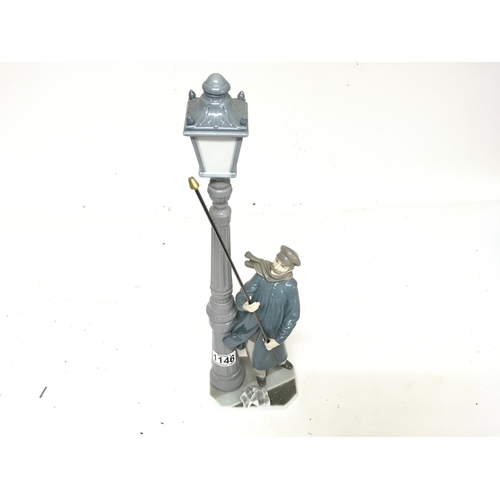 1146 - A large Lladro  figure of a man lighting a street gas lamp no damage. Height 48cm