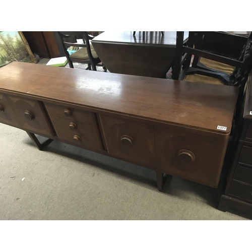 1377 - A circa 1970s elongated modern design sideboard.