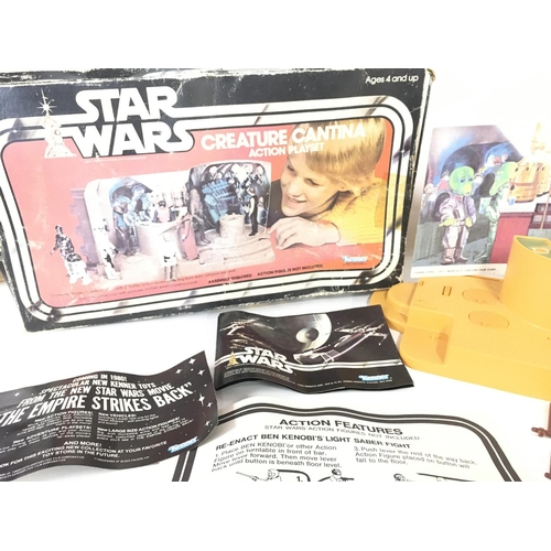 18 - A Boxed Vintage Star Wars Creature Cantina Action Playset. Box is Worn.