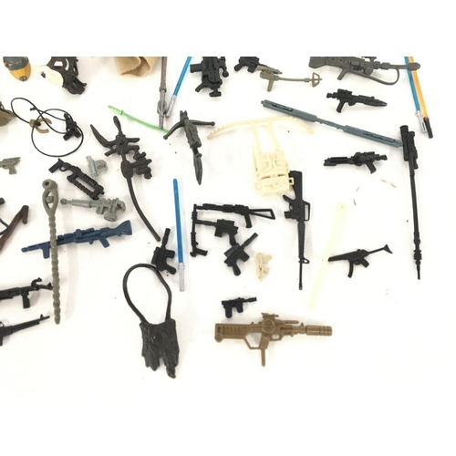 33 - A Collection of Mostly vintage Star Wars Guns and accessories.