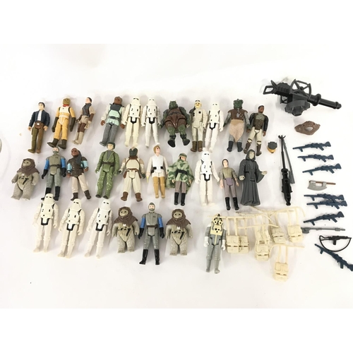 34 - A Collection of Vintage Star Wars Figures and Accessories.