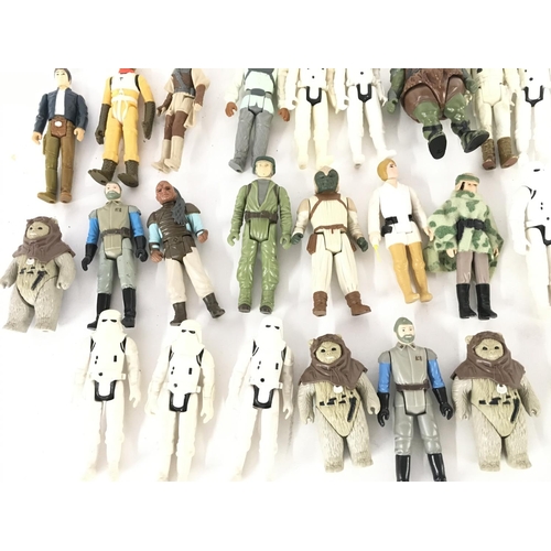 34 - A Collection of Vintage Star Wars Figures and Accessories.