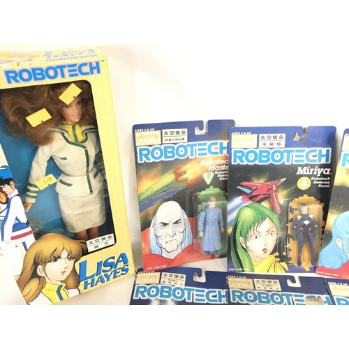 42 - A Collection of Carded Robotech Figures including a 12 inch Lisa Hayes.