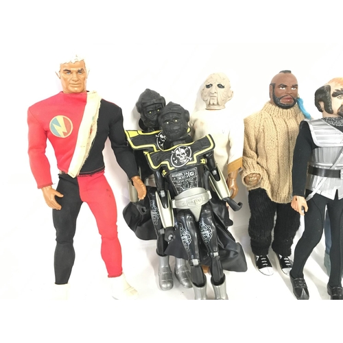 44 - A Collection of Vintage 12 Inch Figures including Star Trek. Battle Star Galactica. The A-Team etc.