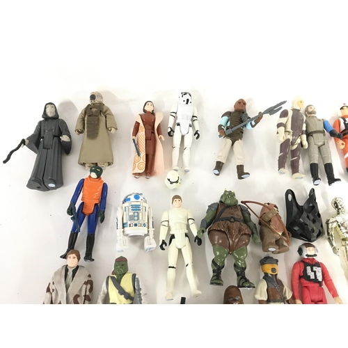 5 - A Collection of Vintage Star Wars Figures including some of your the Last 17. Some with Weapons.