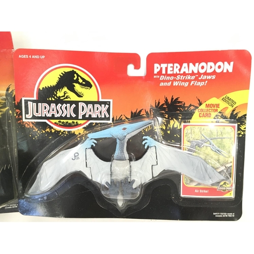 52 - A Boxed Jurassic Park Velociraptor and a Pteranodon. By Kenner.