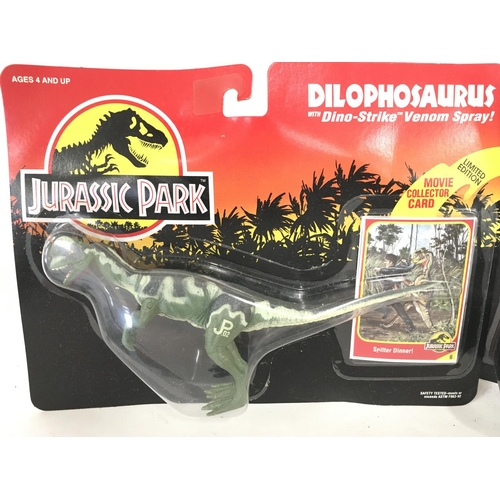 56 - 2 X Jurassic Park Figures Including Dilophosaurus and a Dilophosaurus with Striking Jaw. Both Carded... 