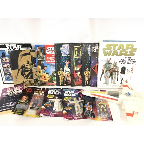 8 - A Collection of Star Wars Collectors Books. Annuals. Carded Figures.