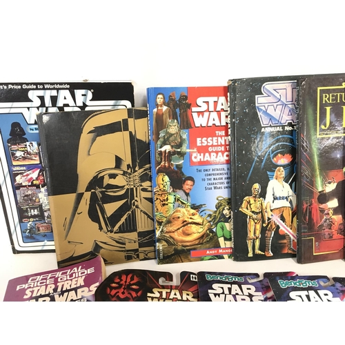 8 - A Collection of Star Wars Collectors Books. Annuals. Carded Figures.