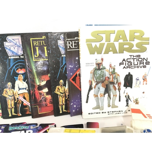 8 - A Collection of Star Wars Collectors Books. Annuals. Carded Figures.