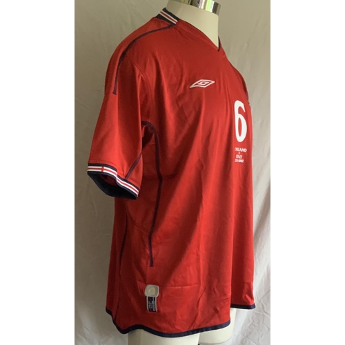 1003 - England 2002 Match Issued Football Shirt: Red short sleeve with number 2 to front and back. Campbell... 