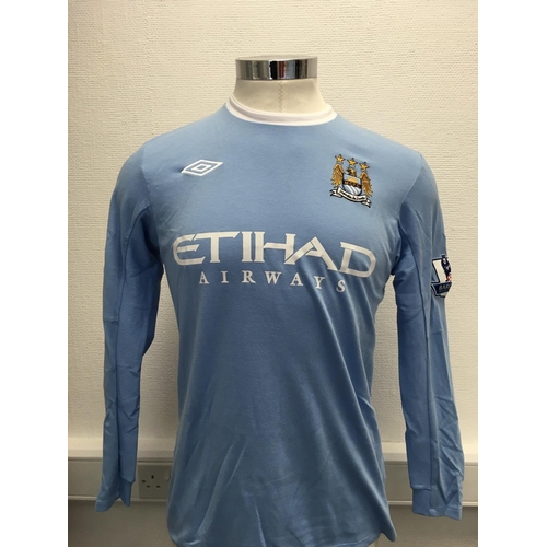 1114 - Manchester City 2009 - 2010 Match Worn Football Shirt: Home long sleeve number 8 with Premier League... 