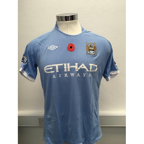 1115 - Manchester City 2010 - 2011 Match Worn Football Shirt: Home Poppy short sleeve number 19 with Premie... 