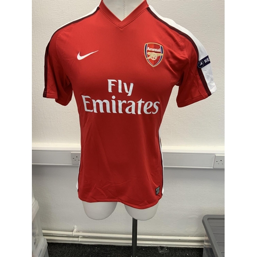 1178 - Arsenal 2009 - 2010 Match Issued Football Shirt: Home short sleeve number 4 with Champions League ba... 