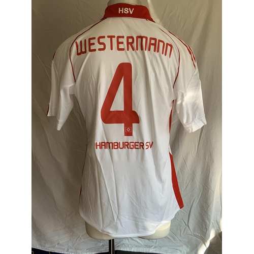 1300 - Hamburg 2010 - 2011 Match Worn Football Shirt: Home short sleeve number 4 with Bundesliga badging to... 