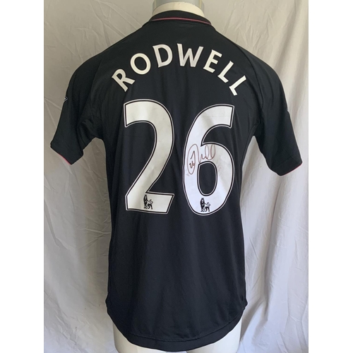 1369 - Rodwell Everton 2009 - 2010 Match Worn Football Shirt: Attractive black with pink stripes Le Coq sho... 