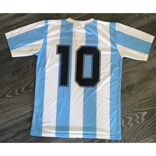 819 - Diego Maradona Signed Argentina Football Shirt: Replica World Cup 86 blue and white striped number 1... 