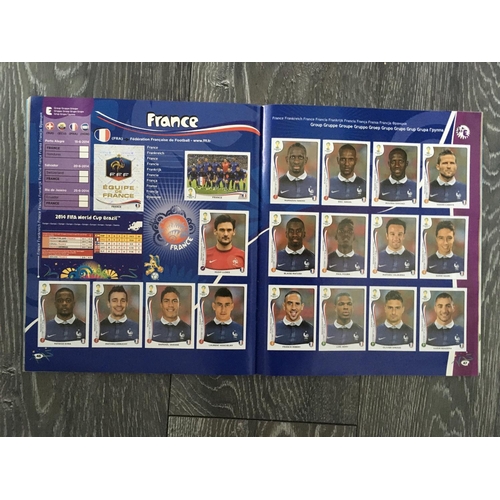 863 - Panini 2014 World Cup Complete Football Sticker Album: Neatly stuck in with no writing. C/W 2 empty ... 