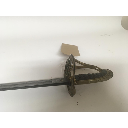 2147 - A Victorian 1845 pattern officers sword the scroll open Guard with Victorian cypher engraved blade B... 