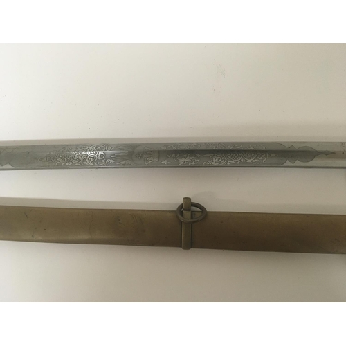 2150 - A Victorian brass field officers sword the decorative guard with Victorian cypher and hinge edge eng... 