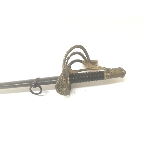 2151 - A French 1855 pattern cavalry sword with a patterned gilt brass Guard steel blade with inscriptions ... 