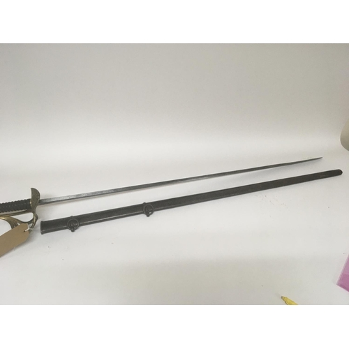 2151 - A French 1855 pattern cavalry sword with a patterned gilt brass Guard steel blade with inscriptions ... 