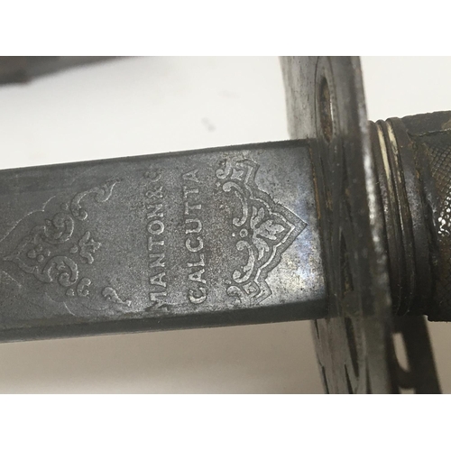 2155 - A Victorian officers sword with steel guard Victorian cypher the steel blade engraved Manton Calcutt... 