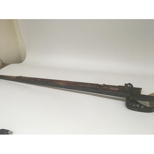 2155 - A Victorian officers sword with steel guard Victorian cypher the steel blade engraved Manton Calcutt... 