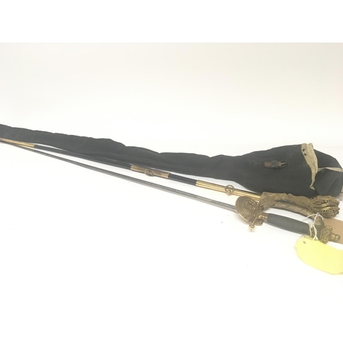 2162 - An elaborate gilt metal Victorian officers dress sword with a crown pommel wired grip engraved blade... 