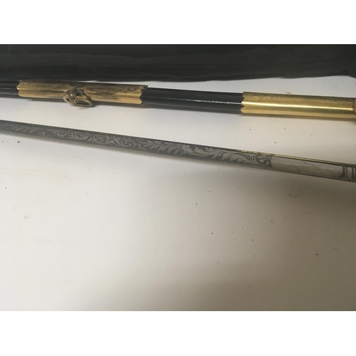 2162 - An elaborate gilt metal Victorian officers dress sword with a crown pommel wired grip engraved blade... 