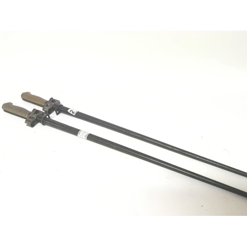 2164 - Two Lebel French stick bayonets with brass grip the M188/35 model. (2)