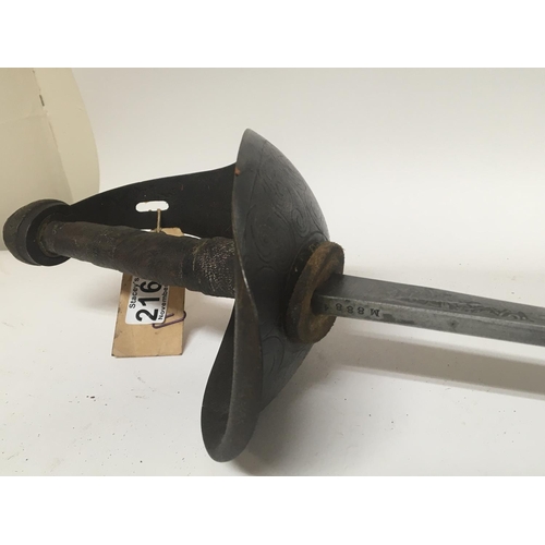 2167 - A George V English Cavalry sword with an enclosed basket hilt engraved steel blade no scabbard.