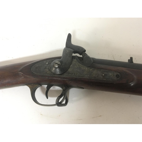 2178 - An Early 19th century service musket rifle muzzle loading percussion action with brass trigger guard... 