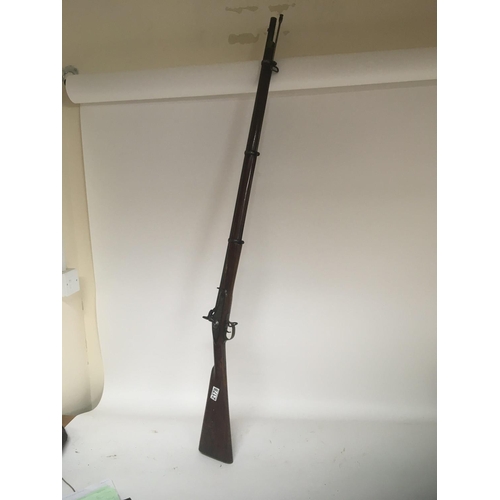 2178 - An Early 19th century service musket rifle muzzle loading percussion action with brass trigger guard... 