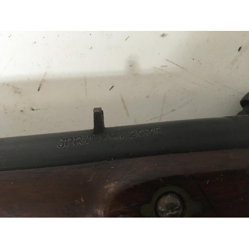 2178 - An Early 19th century service musket rifle muzzle loading percussion action with brass trigger guard... 