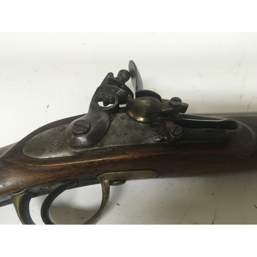 2180 - An unusual early 19th century flintlock musket rifle the steel action engraved Belmqnt three quarter... 