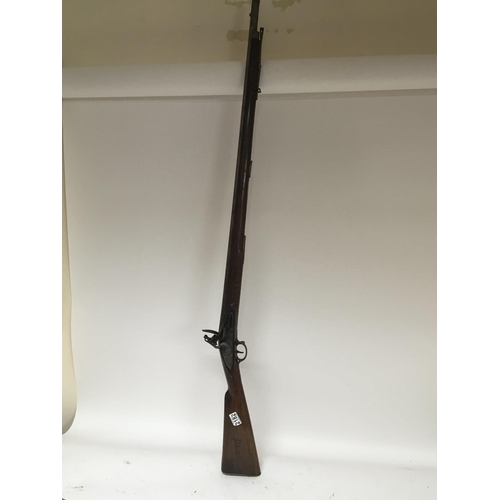2182 - A late 18th or early 19th century flintlock lock musket rifle the action with ground off marks brass... 