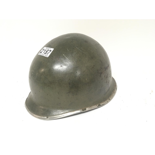 2187 - An American military II world war metal helmet no lining.