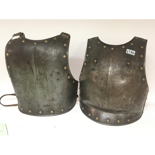 2190 - An Antique Armour breast and back plate with brass stud and shoulder straps metal and leather.