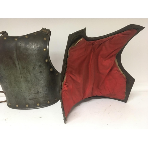 2190 - An Antique Armour breast and back plate with brass stud and shoulder straps metal and leather.