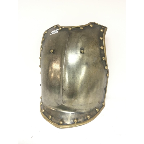 2192 - An antique steel and brass breast plate.