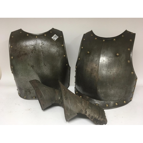 2195 - An Antique Armour steel breast plate and two gauntlets
