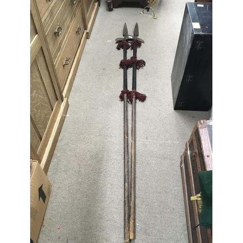 2196 - A set of four Antique Halberds steel ends with wooden shafts.